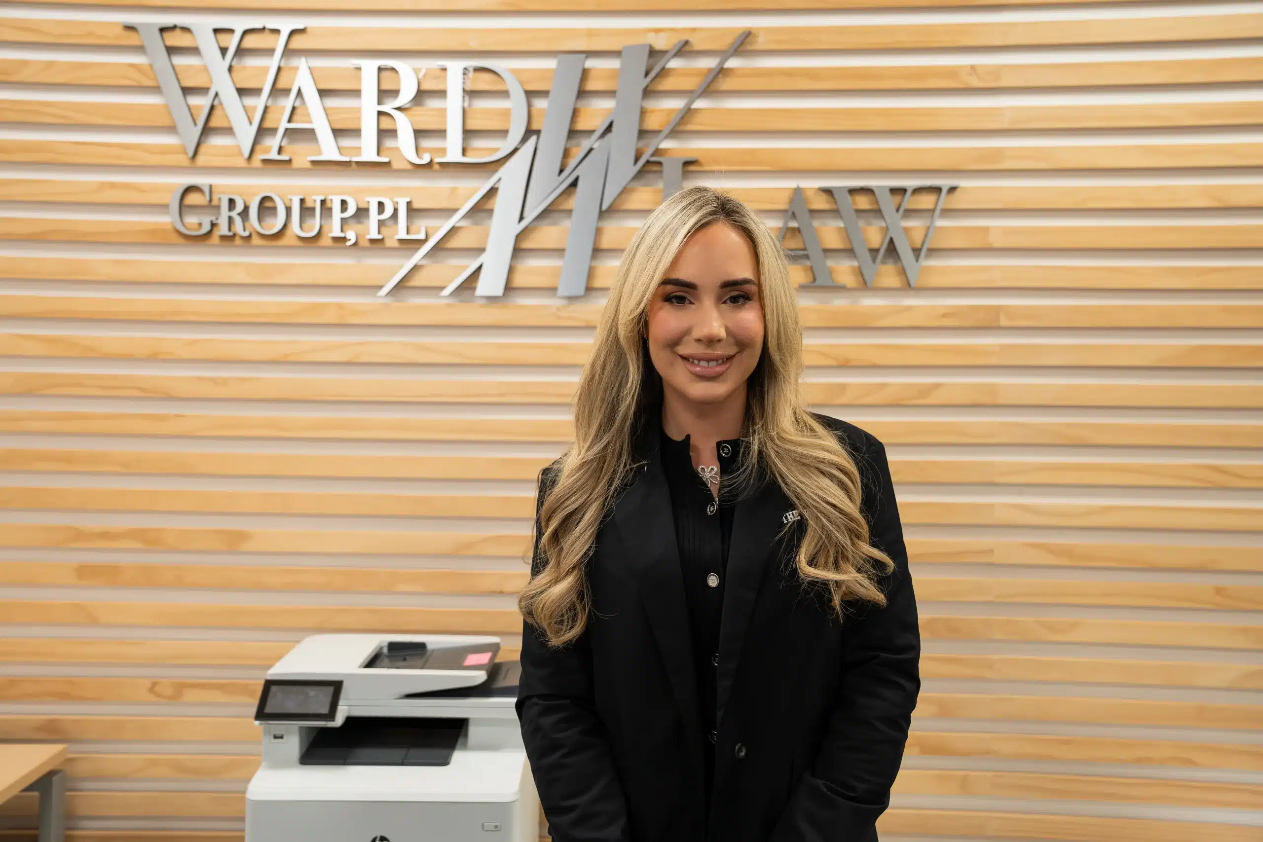 Ward Law attorney standing in the New York City office.