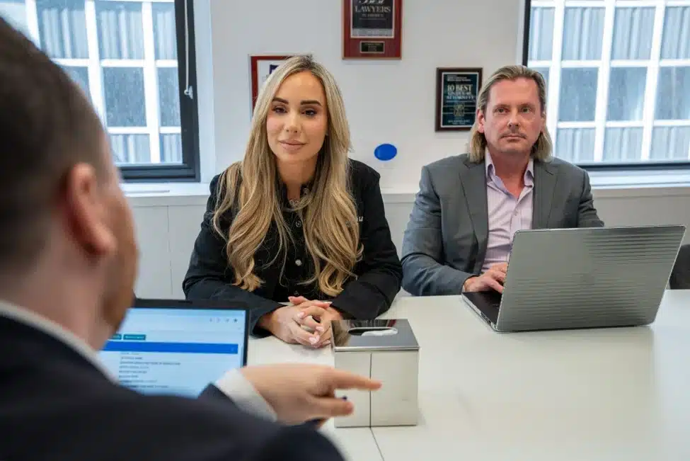 Ward Law motorcycle accident attorneys in conference room discussion
